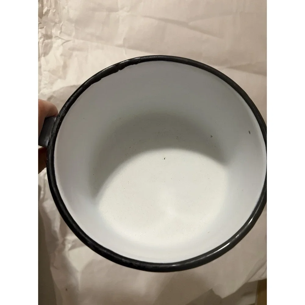 vintage light blue enamelware saucepan